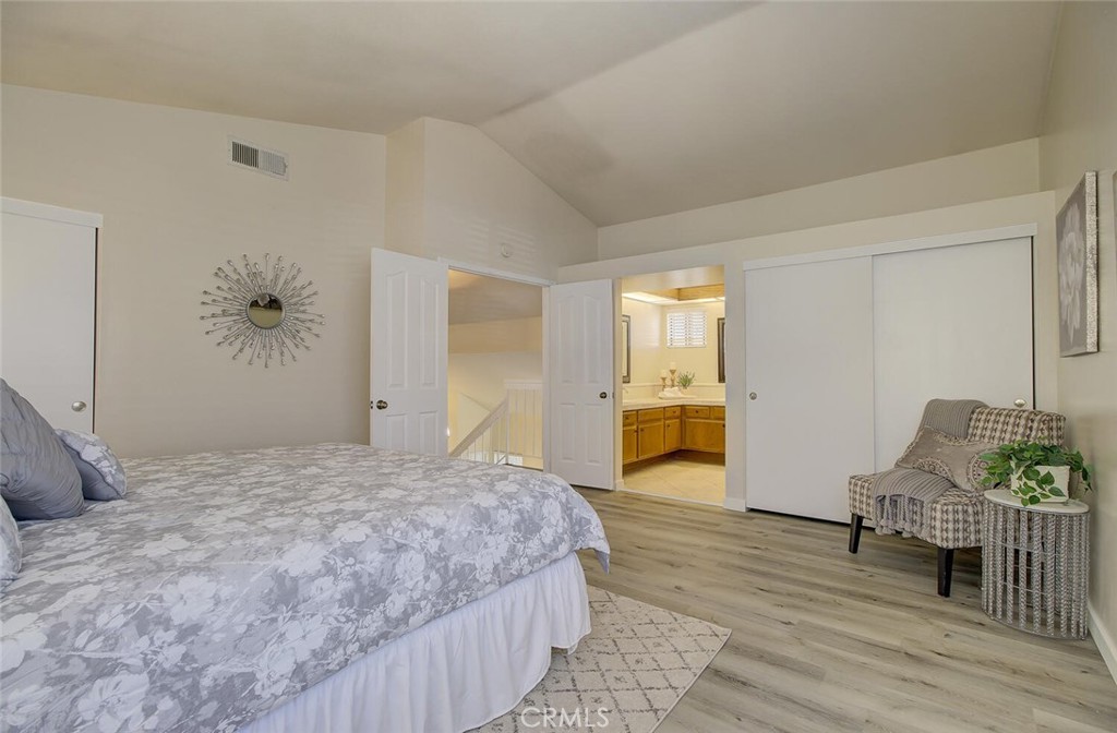 26809 Cold Springs Street Calabasas, CA 91301 - Photo 20 of 33 a bedroom with a bed and table chair