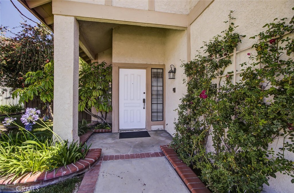 26809 Cold Springs Street Calabasas, CA 91301 - Photo 4 of 33 a couple of potted plants in front of door