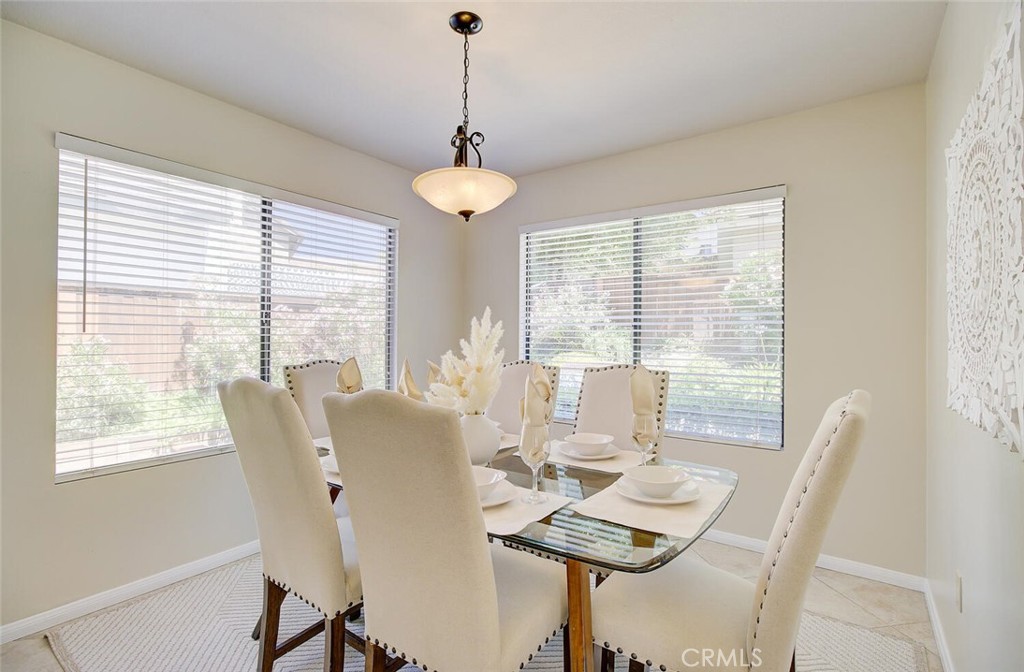 26809 Cold Springs Street Calabasas, CA 91301 - Photo 10 of 33 a view of a dining room with furniture window and outside view