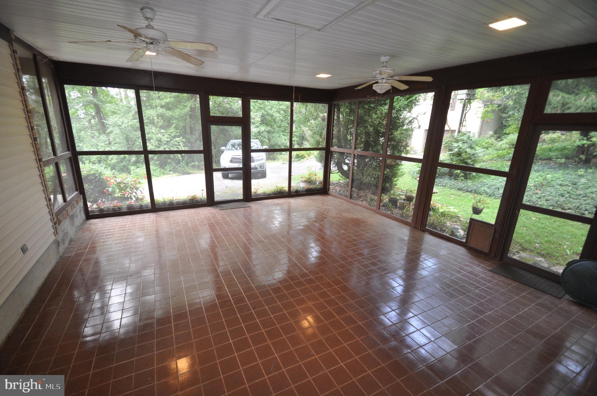 1803 Harvey Yingling Road Manchester, MD 21102 - Photo 24 of 30 Screened porch located off of family room at front