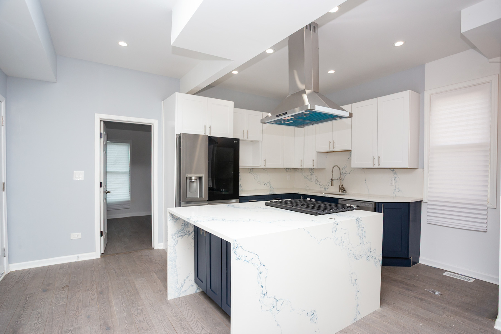 8810 South Morgan Street Chicago, IL 60620 - Photo 3 of 18 a kitchen that has a sink a refrigerator and a stove top oven