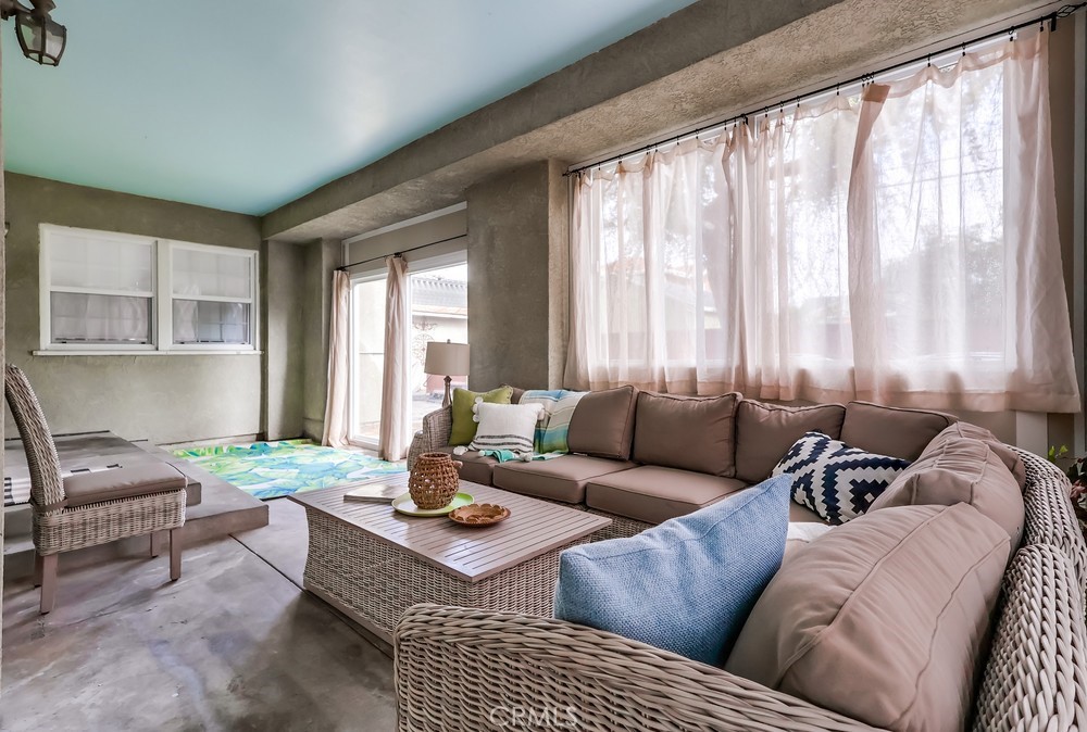 15302 Doty Avenue Lawndale, CA 90260 - Photo 21 of 26 a living room with furniture and a large window