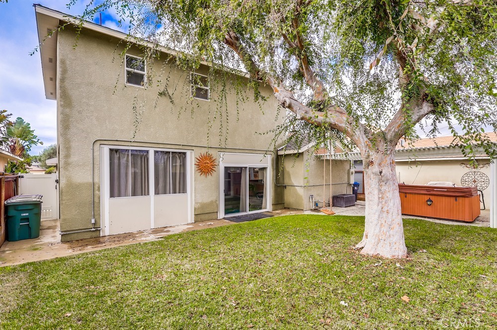 15302 Doty Avenue Lawndale, CA 90260 - Photo 25 of 26 a front view of a house with a yard and garage