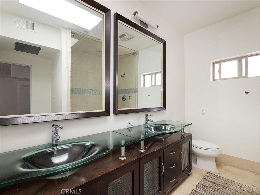 1225 East Grand Avenue, Unit B El Segundo, CA 90245 - Photo 10 of 21 a bathroom with a sink and a toilet