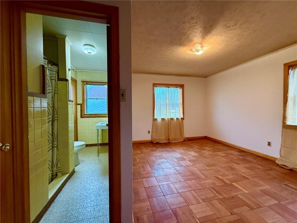 119 Pine Run Church Road Apollo, PA 15613 - Photo 10 of 20 a view of a bathroom with a shower and a sink