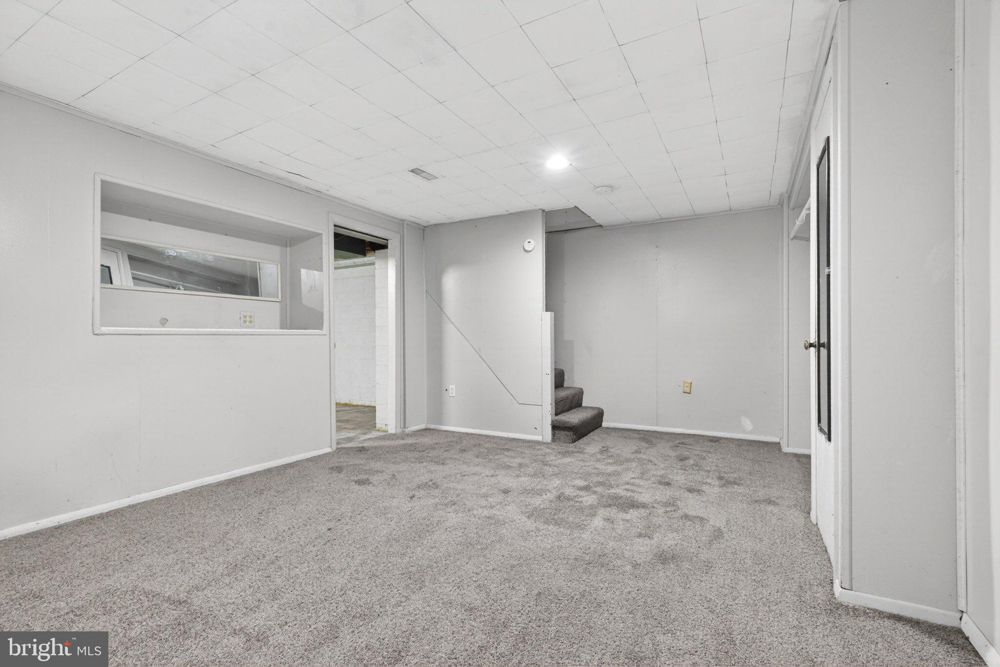 7729 Charlesmont Road Baltimore, MD 21222 - Photo 30 of 38 Spacious, versatile living area awaits.