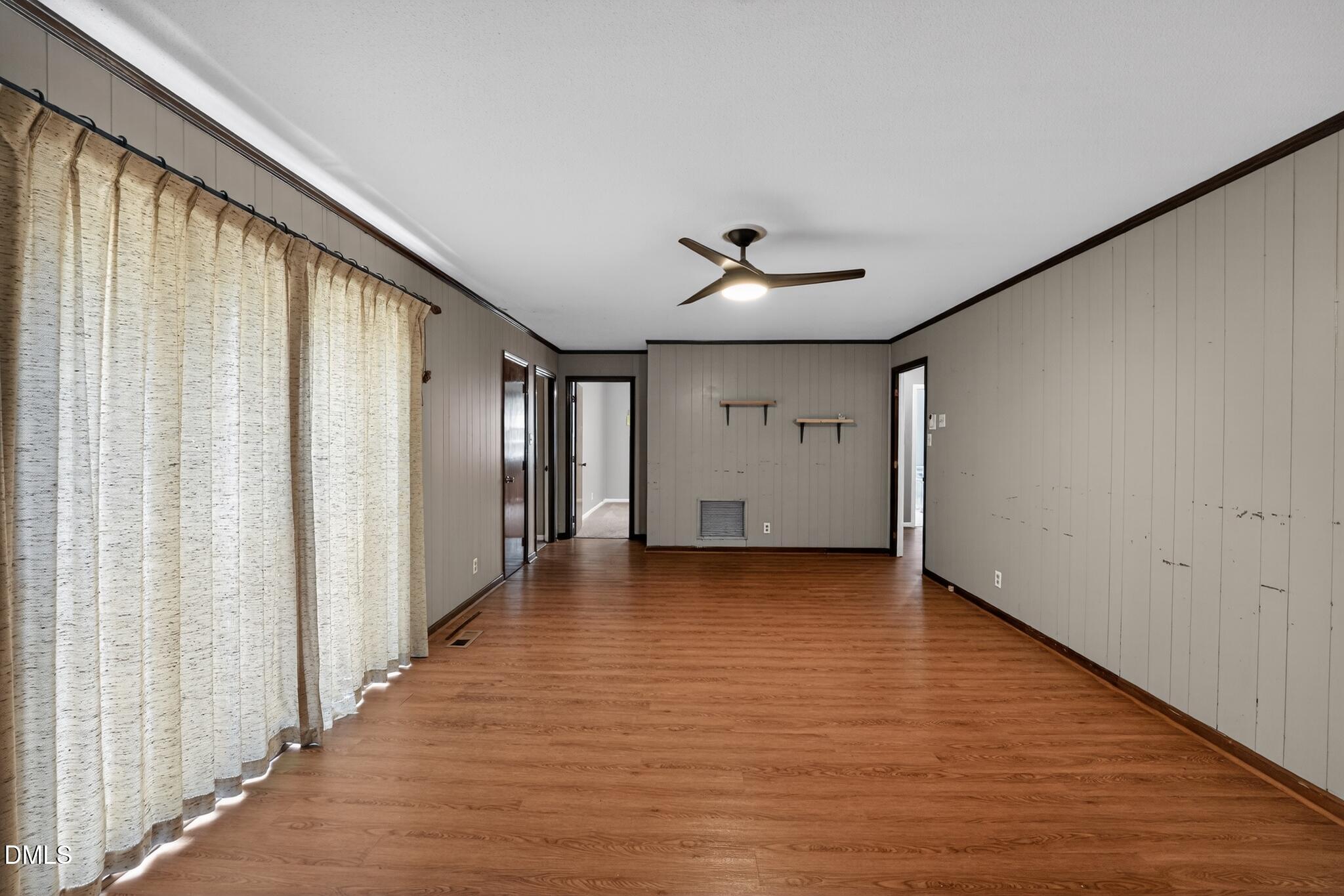 1034 Jerome Road Durham, NC 27713 - Photo 12 of 35 wooden floor in an empty room with a window