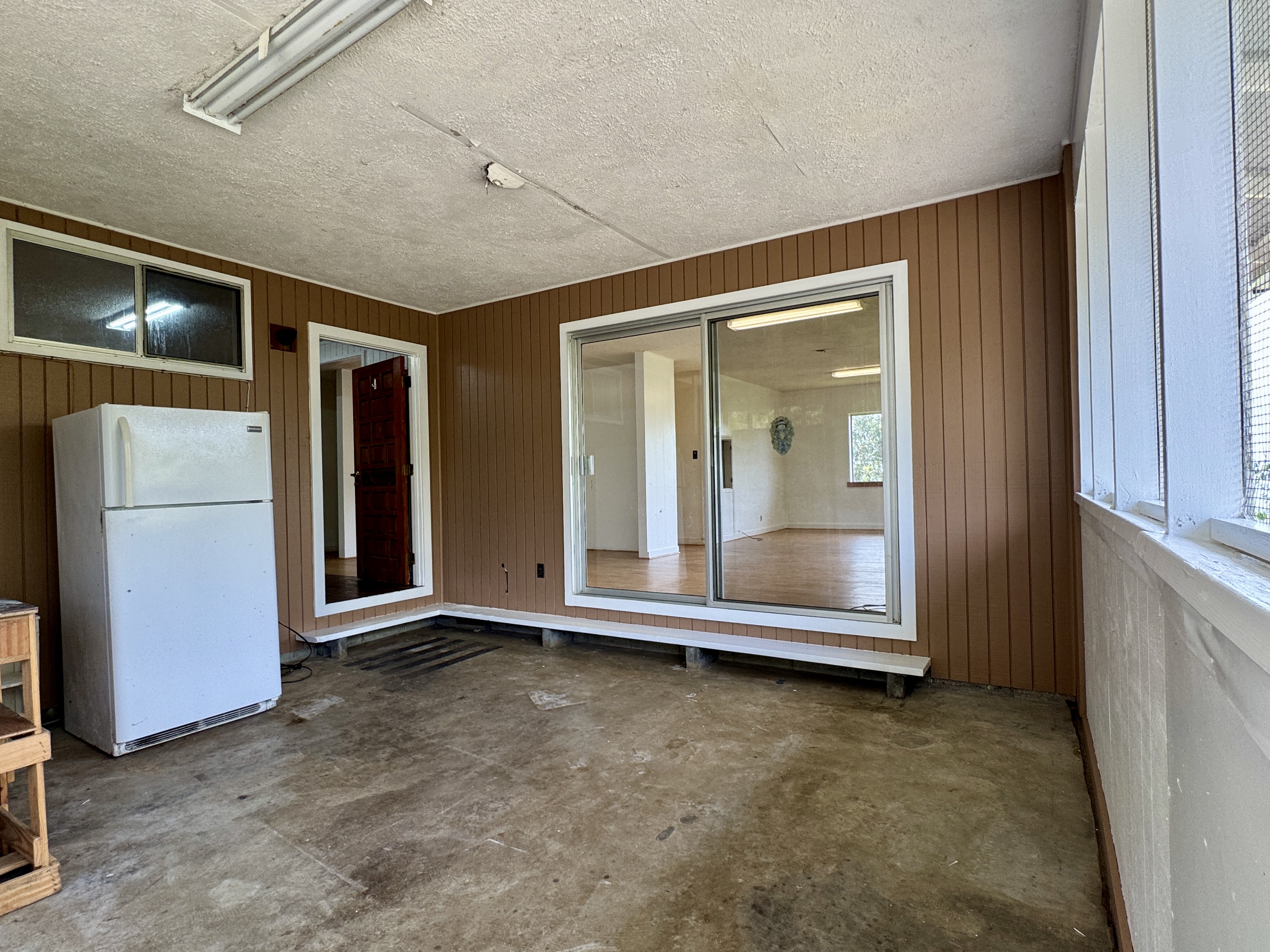 82-1226 Kinue Road Captain Cook, HI 96704 - Photo 2 of 28 an empty room with window