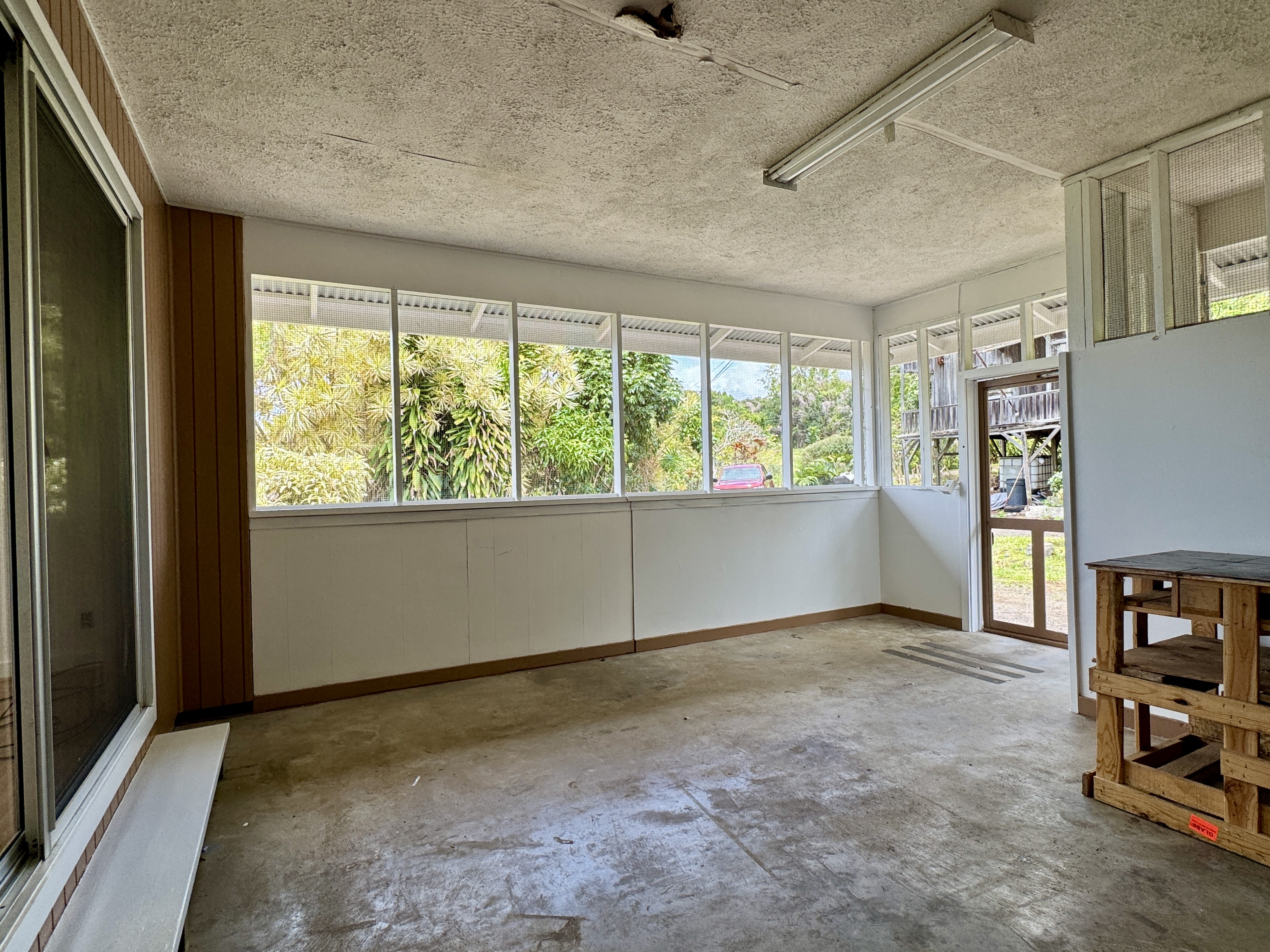 82-1226 Kinue Road Captain Cook, HI 96704 - Photo 3 of 28 a view of workspace with furniture and a window