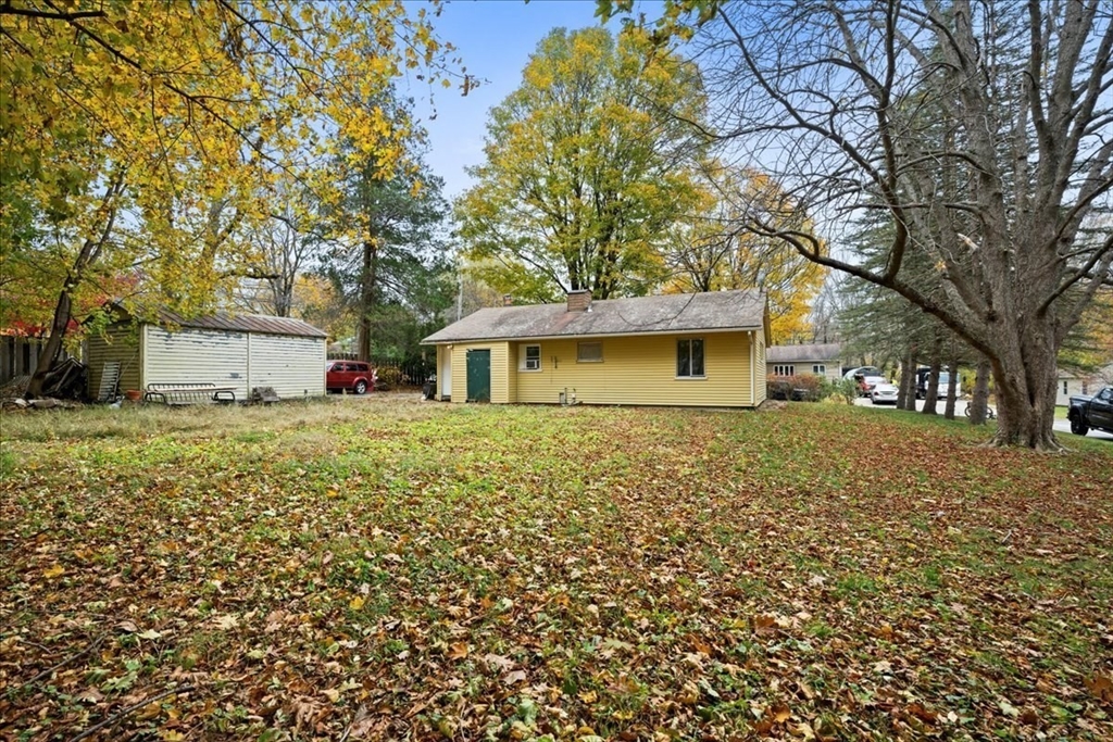 2 Sunset Lane Spencer, MA 01562 - Photo 15 of 37 a front view of a house with a garden
