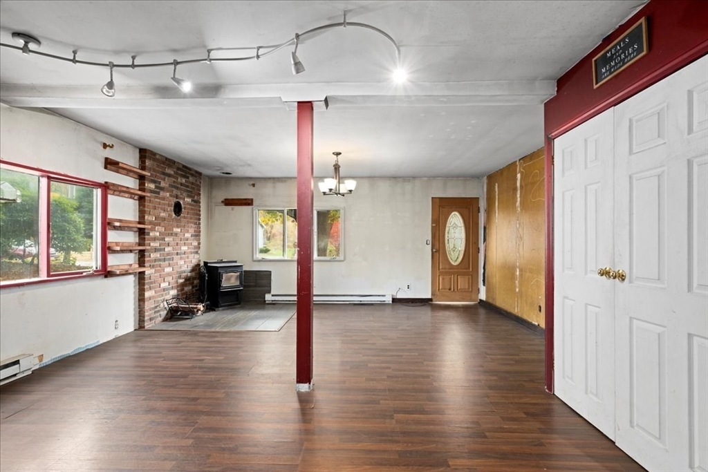 2 Sunset Lane Spencer, MA 01562 - Photo 26 of 37 a view of a livingroom with wooden floor and furniture