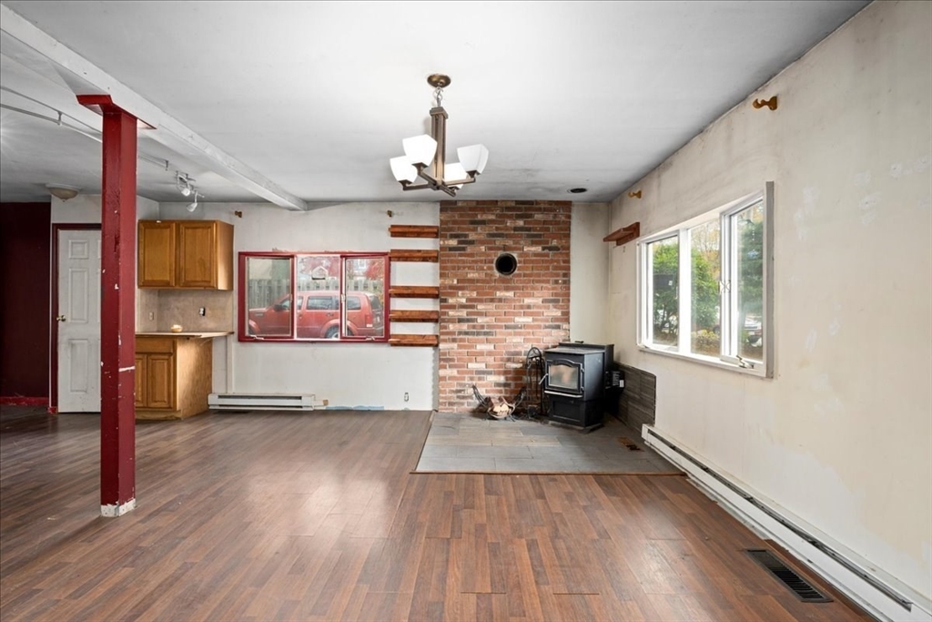 2 Sunset Lane Spencer, MA 01562 - Photo 28 of 37 a living room with furniture and a wooden floor