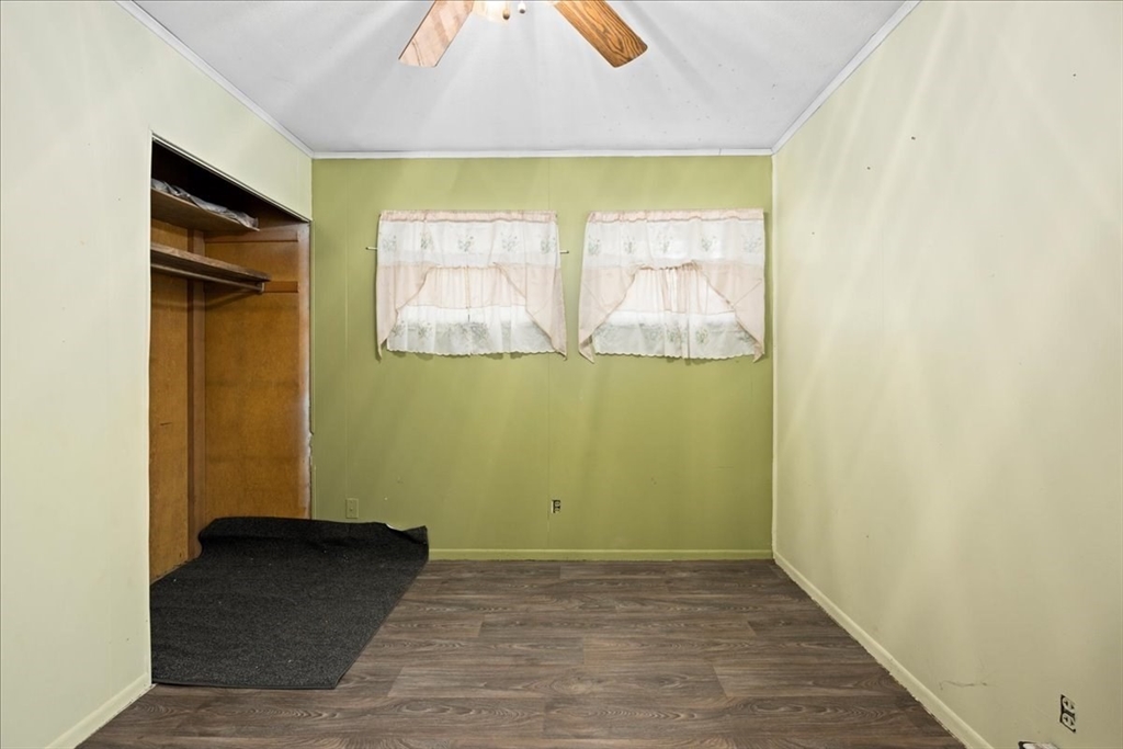 2 Sunset Lane Spencer, MA 01562 - Photo 33 of 37 a view of an empty room with wooden floor and a window