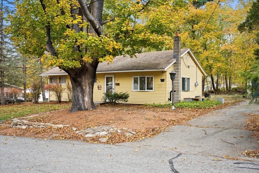 2 Sunset Lane Spencer, MA 01562 - Photo 4 of 37 a front view of a house with a garden