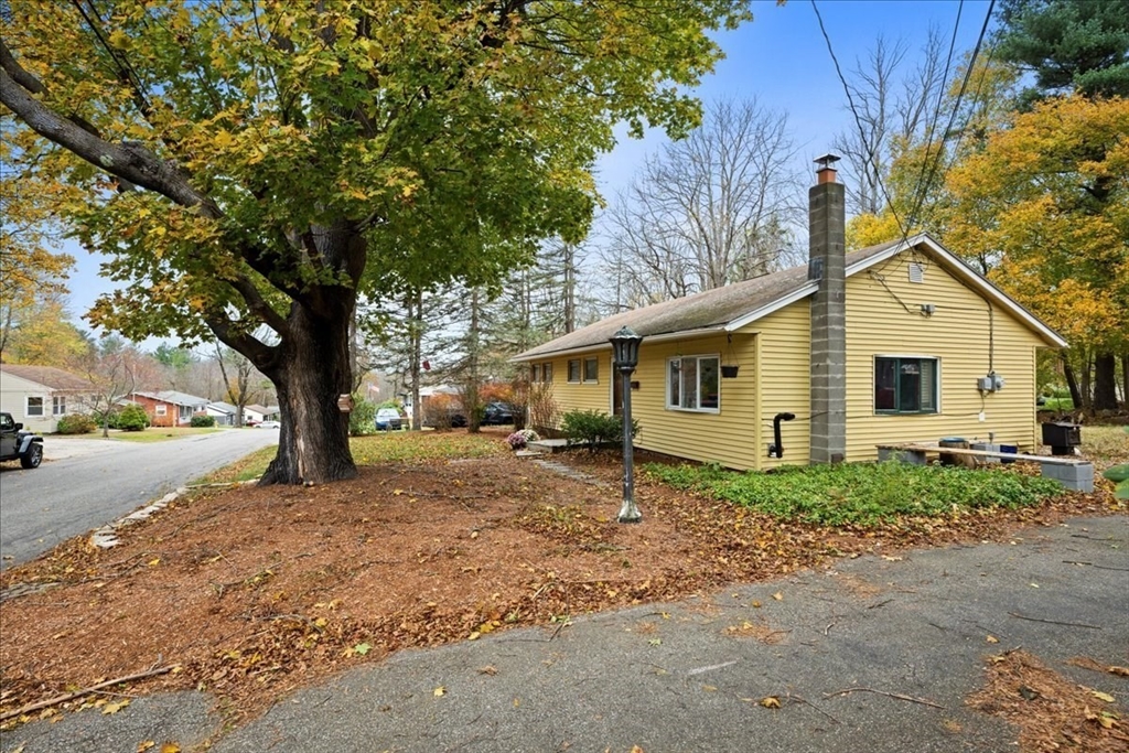 2 Sunset Lane Spencer, MA 01562 - Photo 6 of 37 a view of a yard with a house and tree s