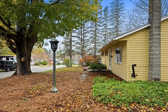 a backyard of a house with lots of green space