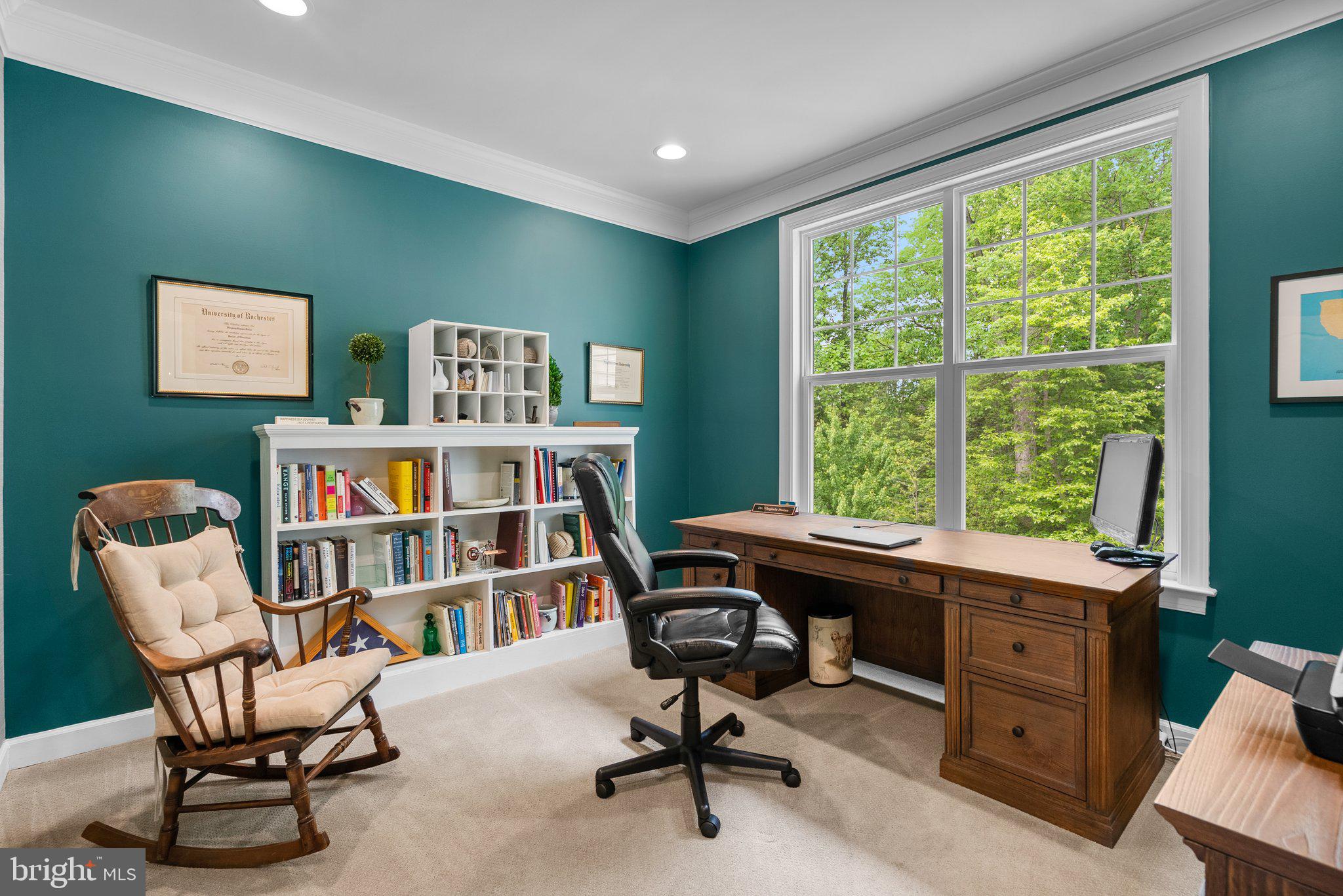 161 Moore Road Arnold, MD 21012 - Photo 18 of 57 a view of a workspace with furniture and a window