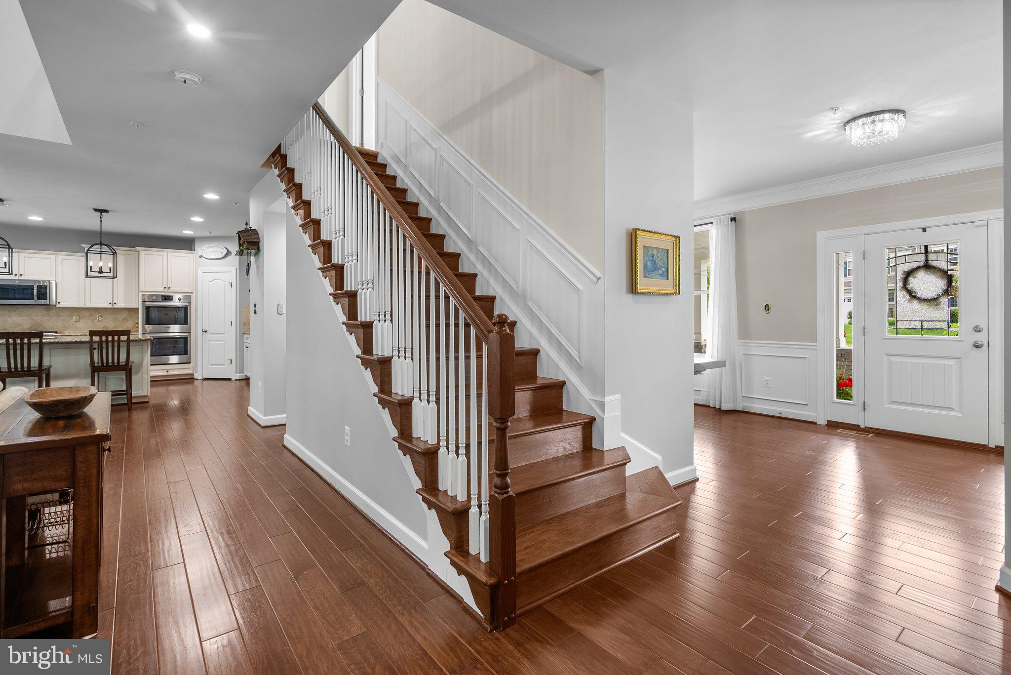 161 Moore Road Arnold, MD 21012 - Photo 21 of 57 a view of entryway and hall with wooden floor