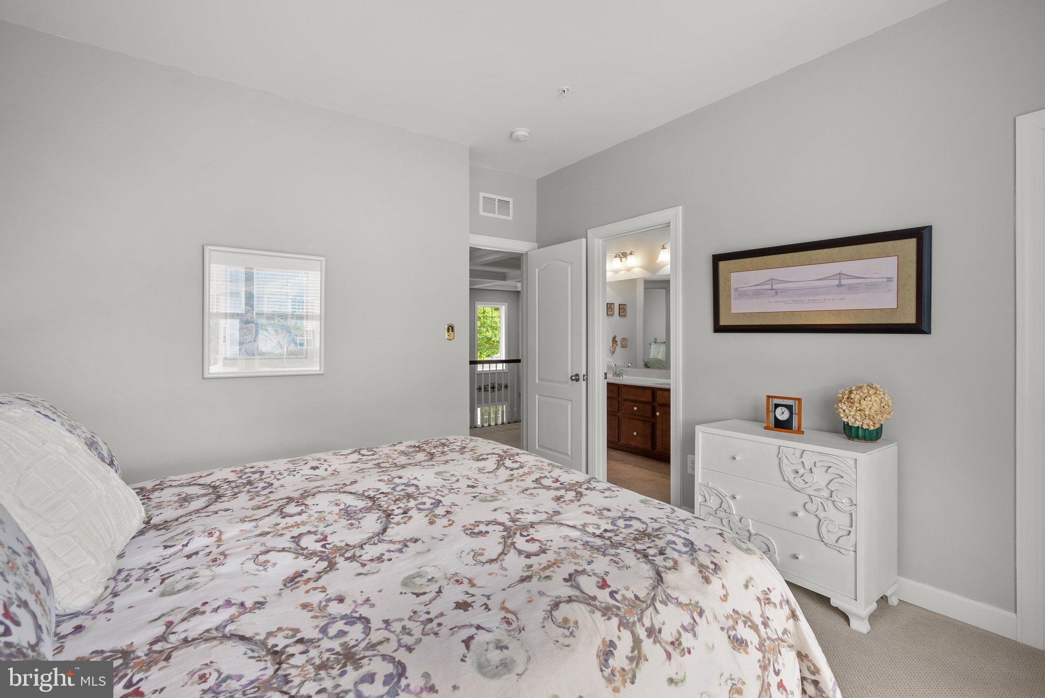 161 Moore Road Arnold, MD 21012 - Photo 32 of 57 a bedroom with a bed and a cabinets