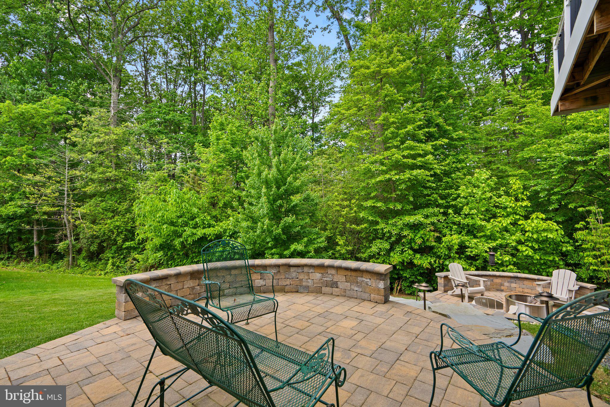 161 Moore Road Arnold, MD 21012 - Photo 46 of 57 a view of backyard with a table and chairs