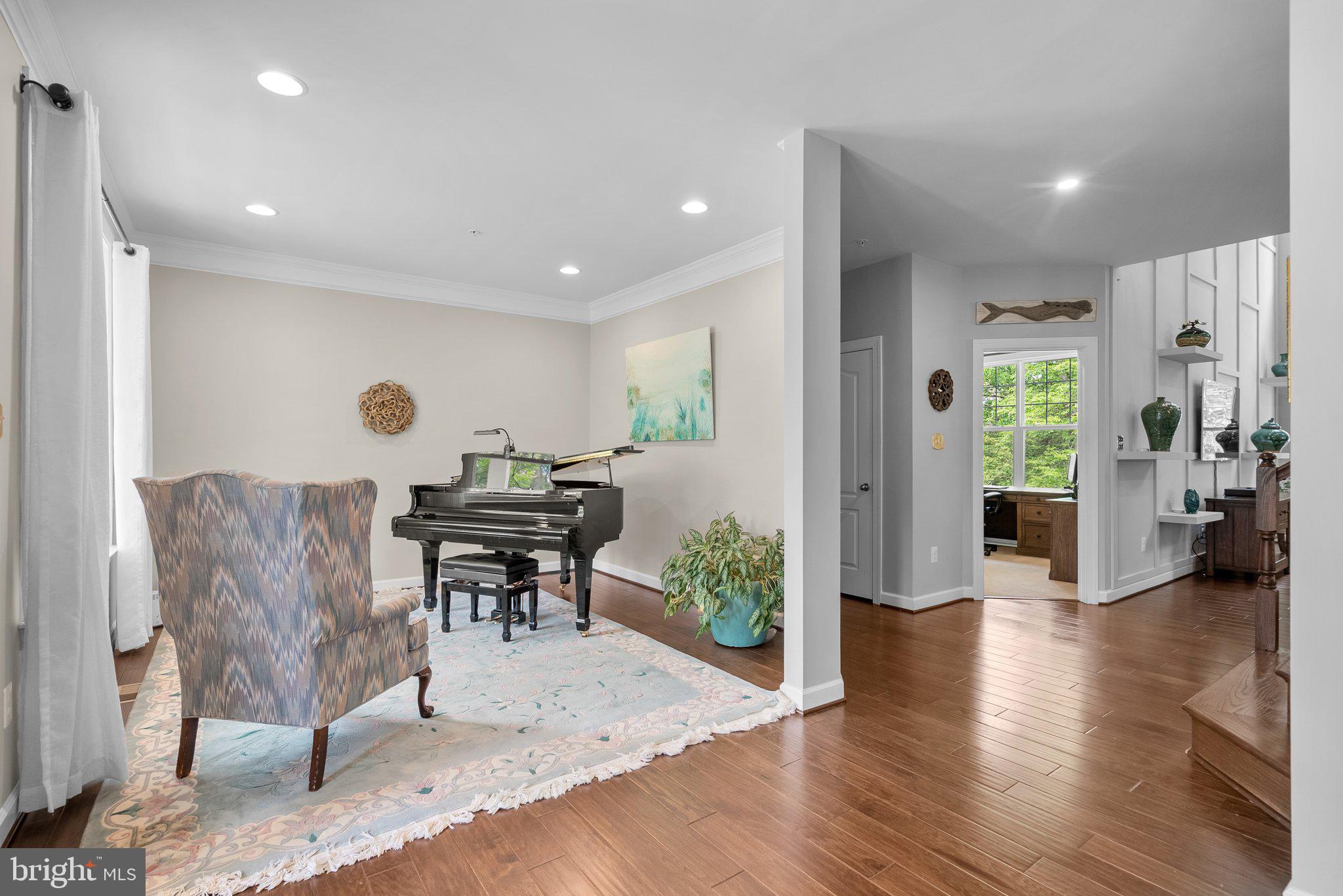 161 Moore Road Arnold, MD 21012 - Photo 5 of 57 a living room with furniture and a wooden floor
