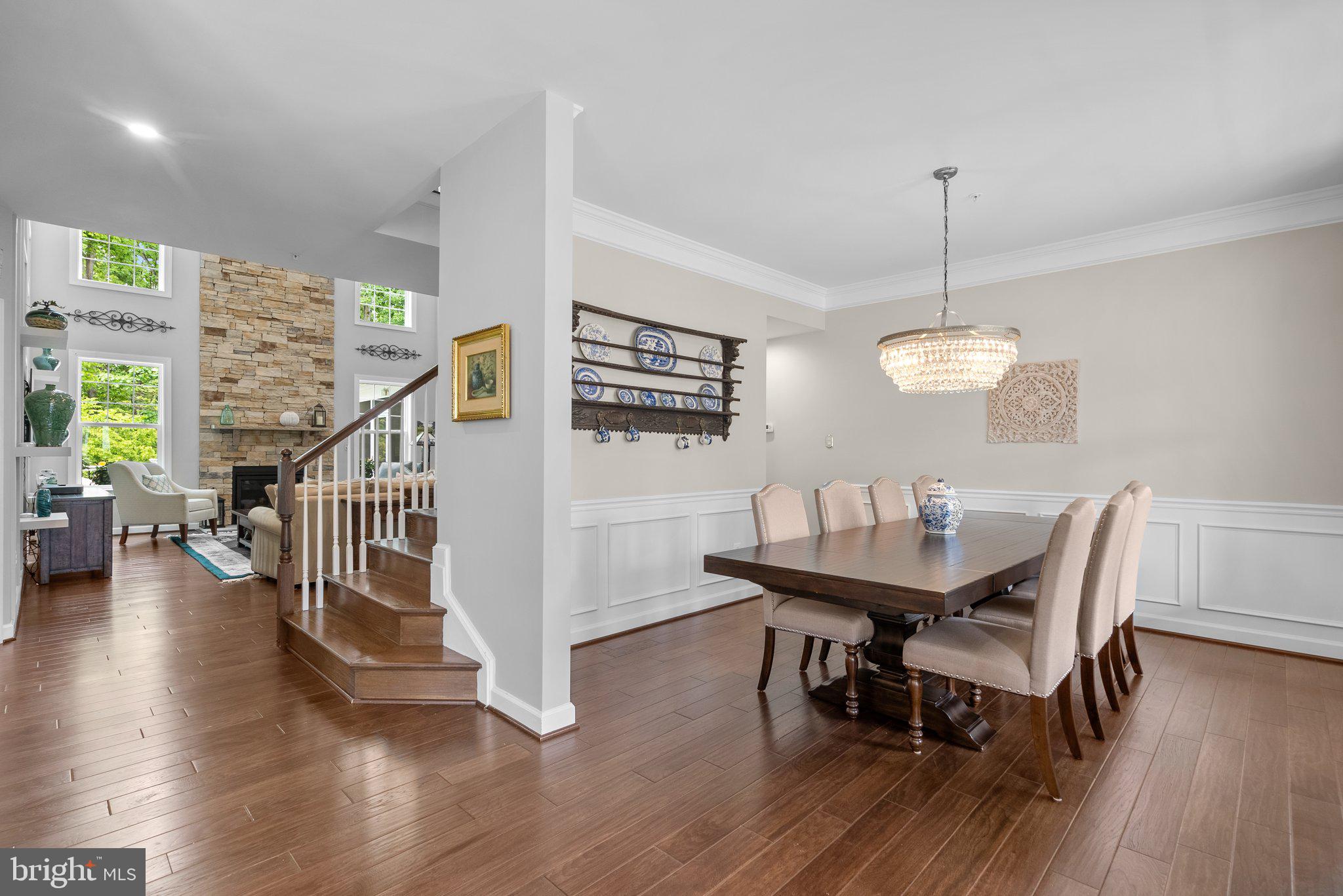 161 Moore Road Arnold, MD 21012 - Photo 6 of 57 a view of a dining room with furniture and wooden floor