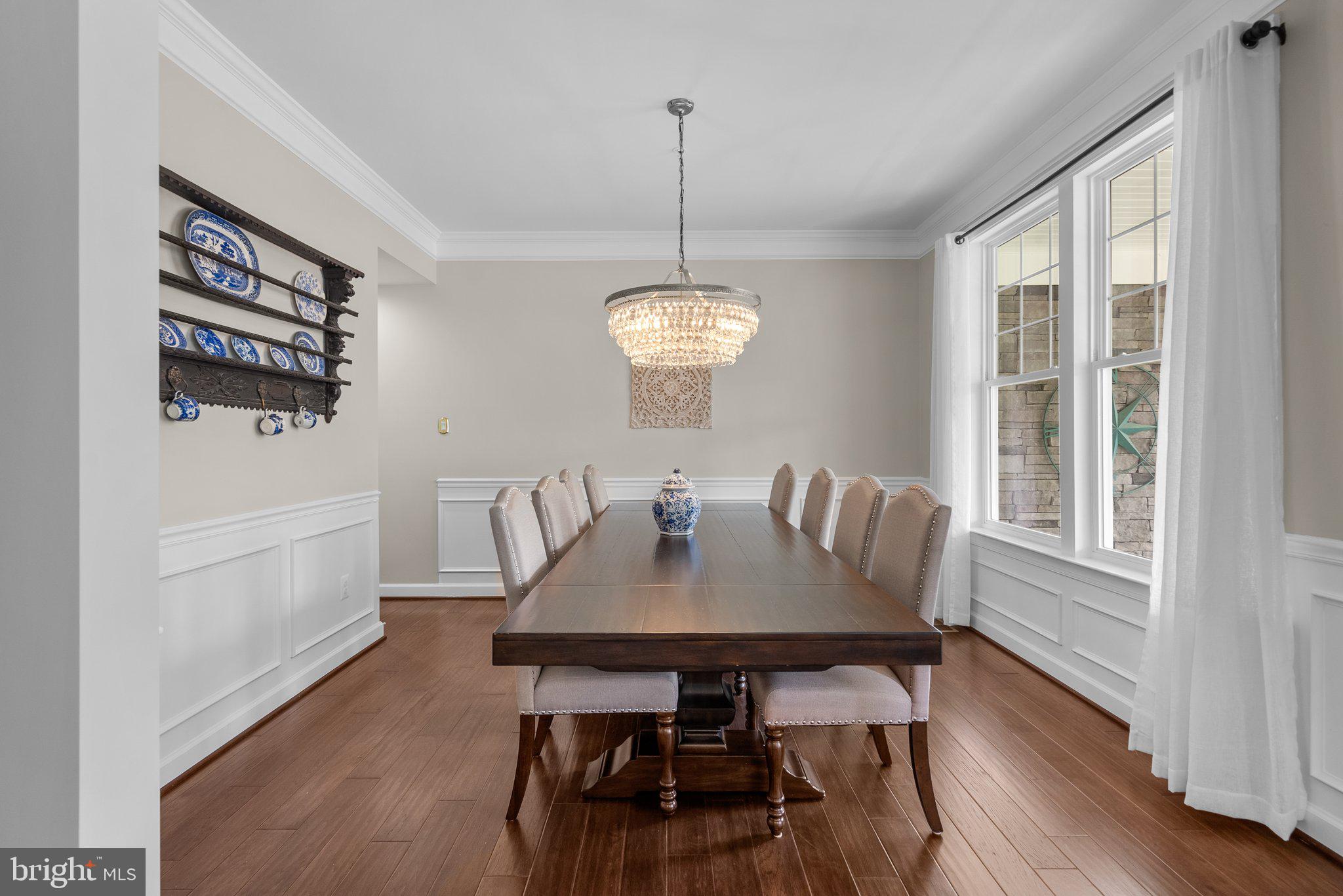 161 Moore Road Arnold, MD 21012 - Photo 8 of 57 a view of a dining room with furniture window and wooden floor