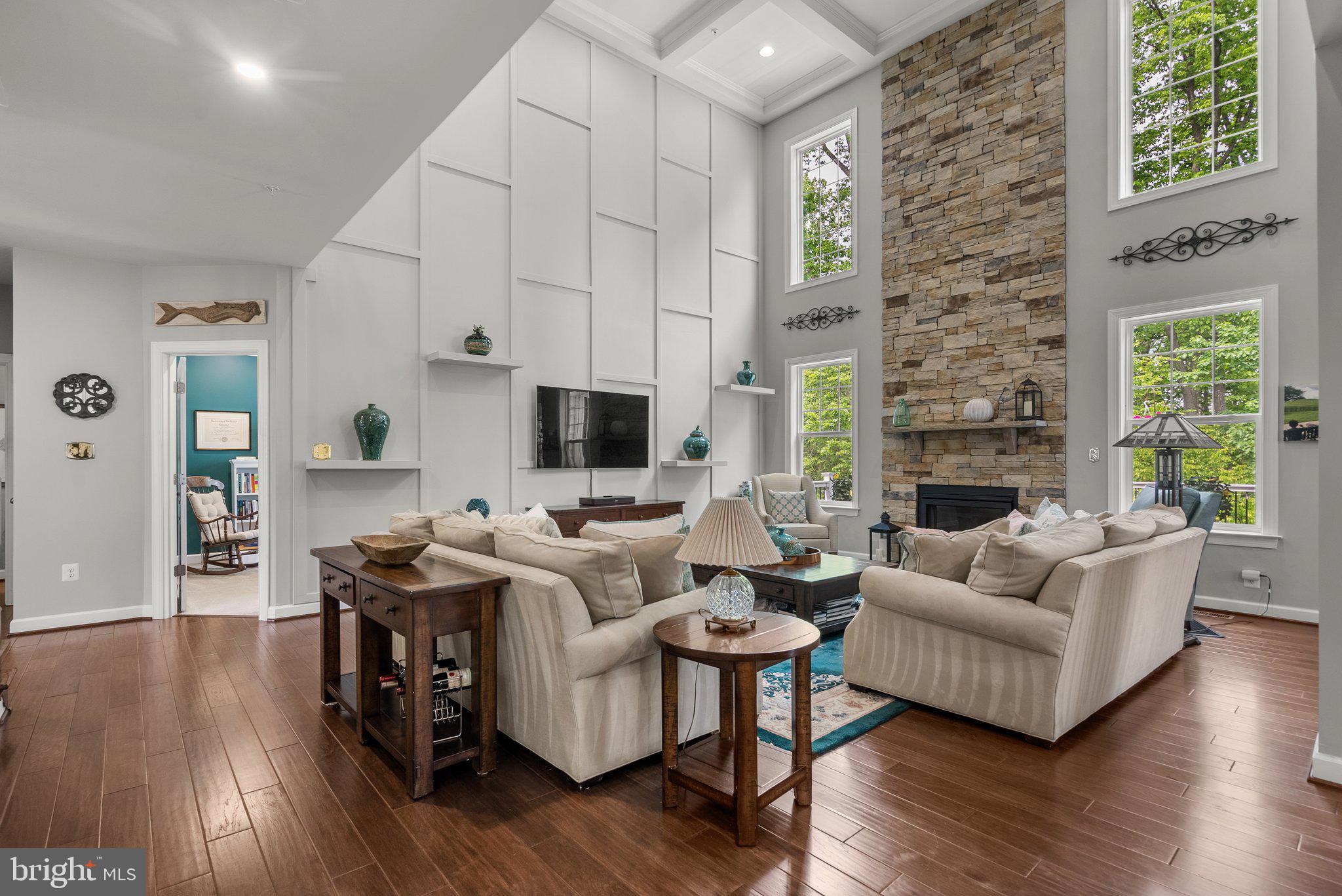 161 Moore Road Arnold, MD 21012 - Photo 10 of 57 a living room with furniture fireplace and wooden floor