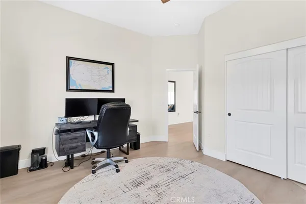 a view of a workspace with furniture