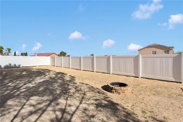 a view of a backyard of a house