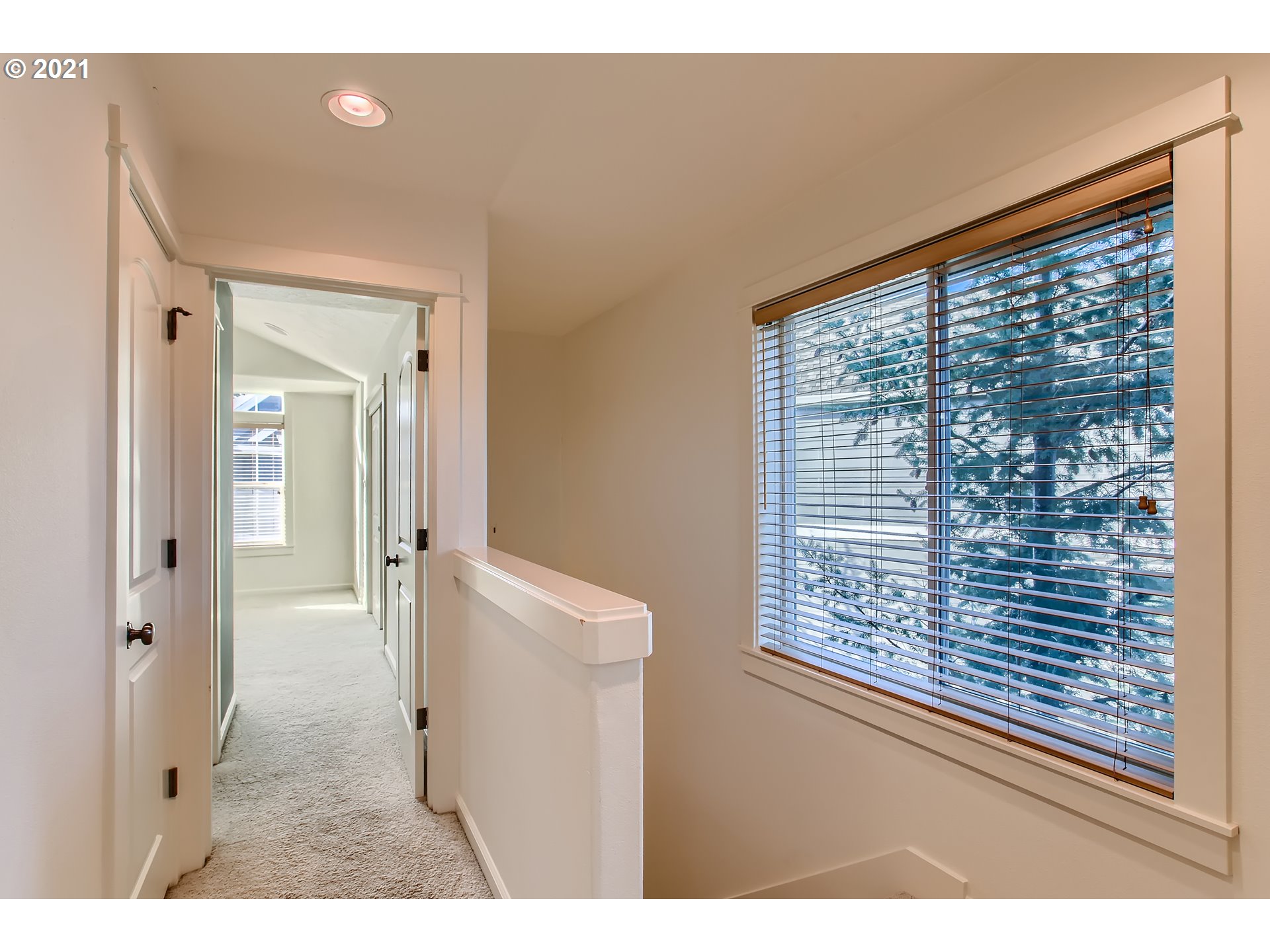 3621 Southwest Innovation Court Beaverton, OR 97003 - Photo 24 of 32 a view of hallway with a large window and wooden floor