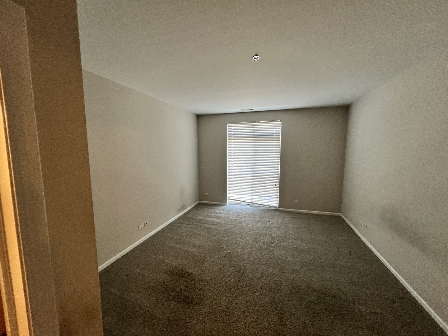 625 Deerfield Road, Unit 307 Deerfield, IL 60015 - Photo 7 of 12 a view of an empty room and a window