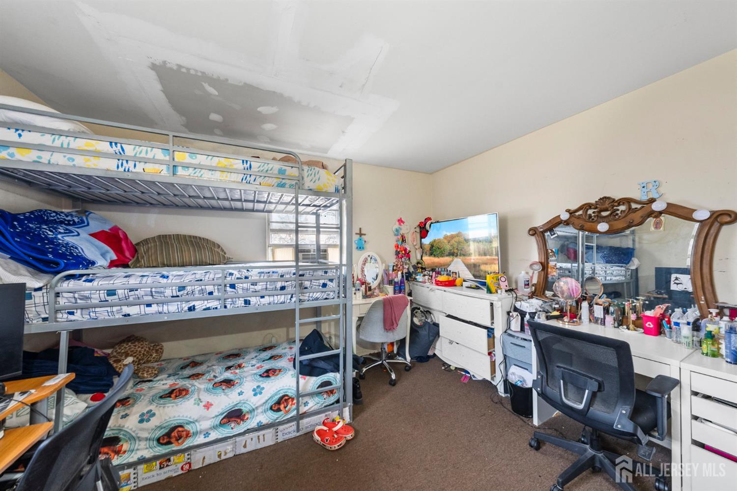 16 Millstone Road Somerset, NJ 08873 - Photo 14 of 35 a bed room with a bed and a desk