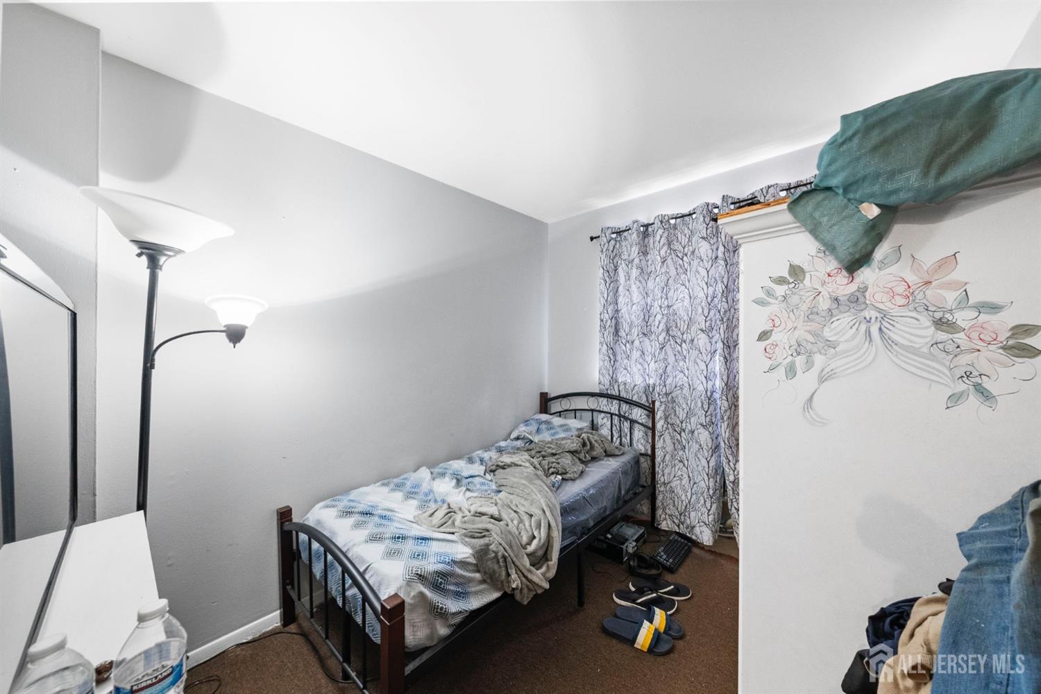 16 Millstone Road Somerset, NJ 08873 - Photo 17 of 35 a bedroom with a bed and a window