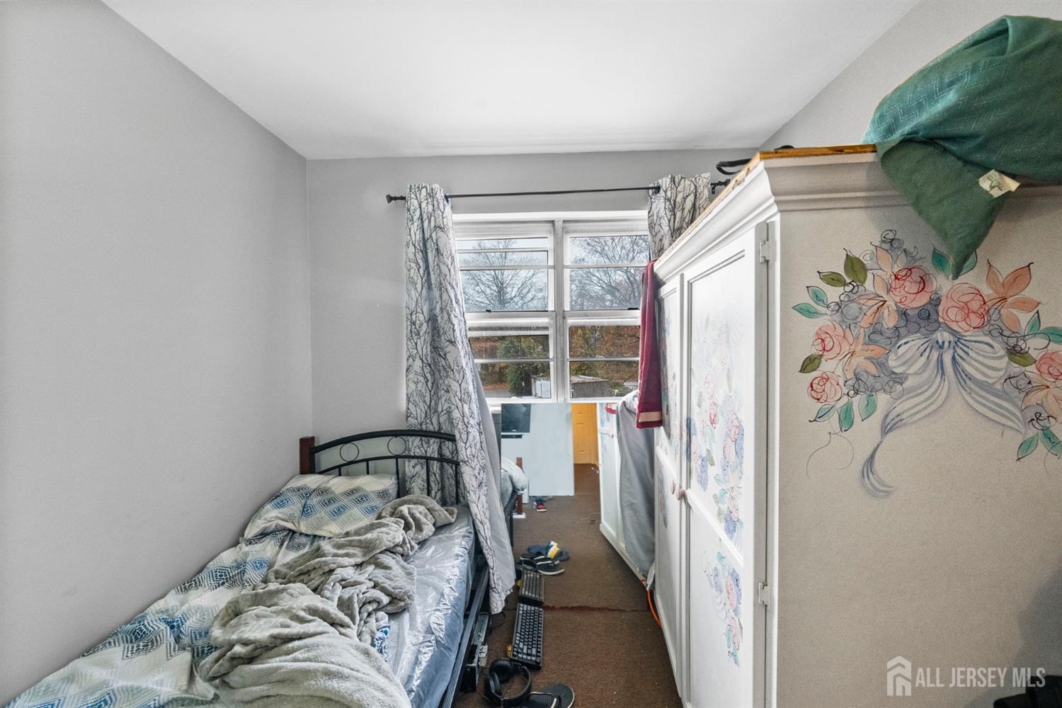 16 Millstone Road Somerset, NJ 08873 - Photo 18 of 35 a bedroom with a bed and a window