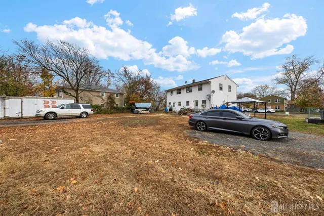 a view of a street with cars