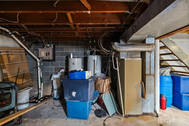 a bedroom with bed and a window
