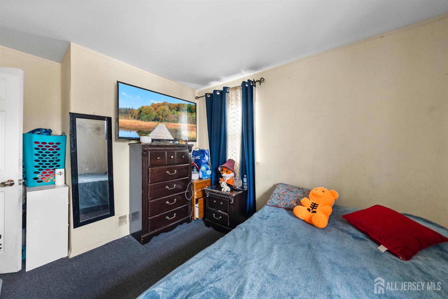 16 Millstone Road Somerset, NJ 08873 - Photo 31 of 35 a bedroom with a bed and a window