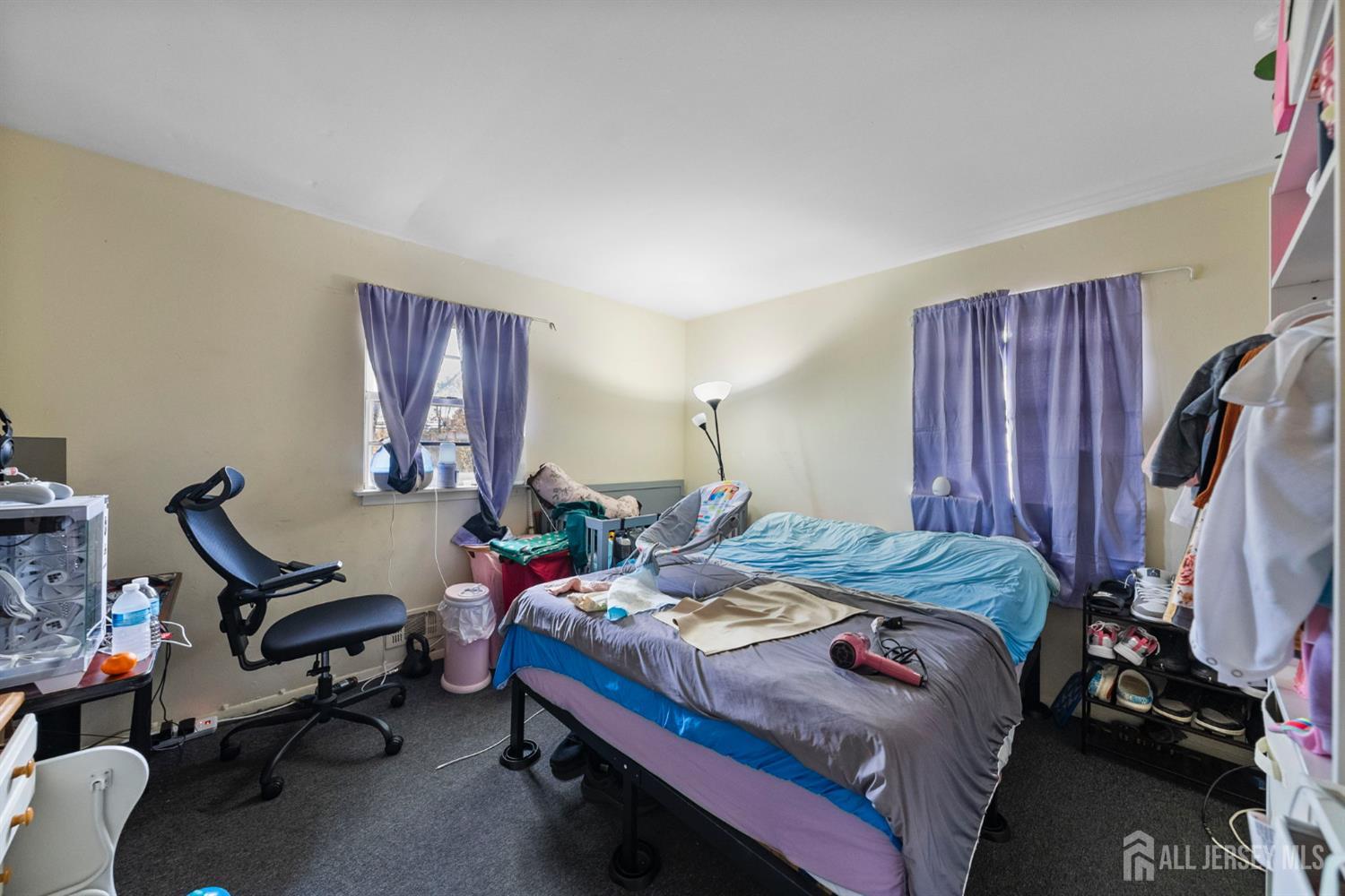 16 Millstone Road Somerset, NJ 08873 - Photo 33 of 35 a bedroom that has a bed and a chair