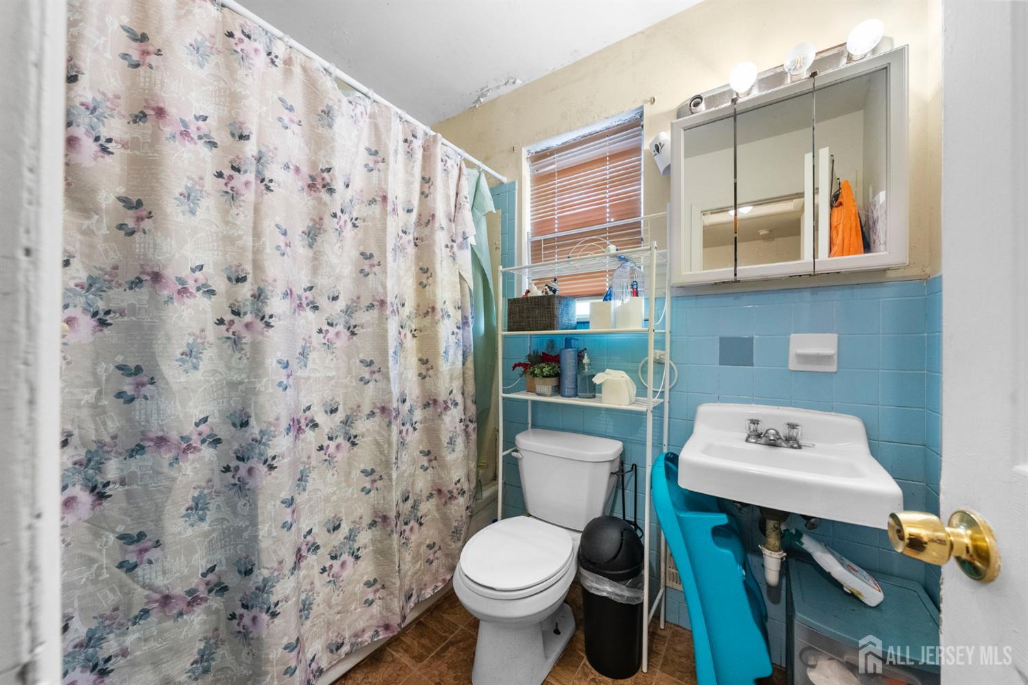 16 Millstone Road Somerset, NJ 08873 - Photo 35 of 35 a bathroom with a toilet and a sink