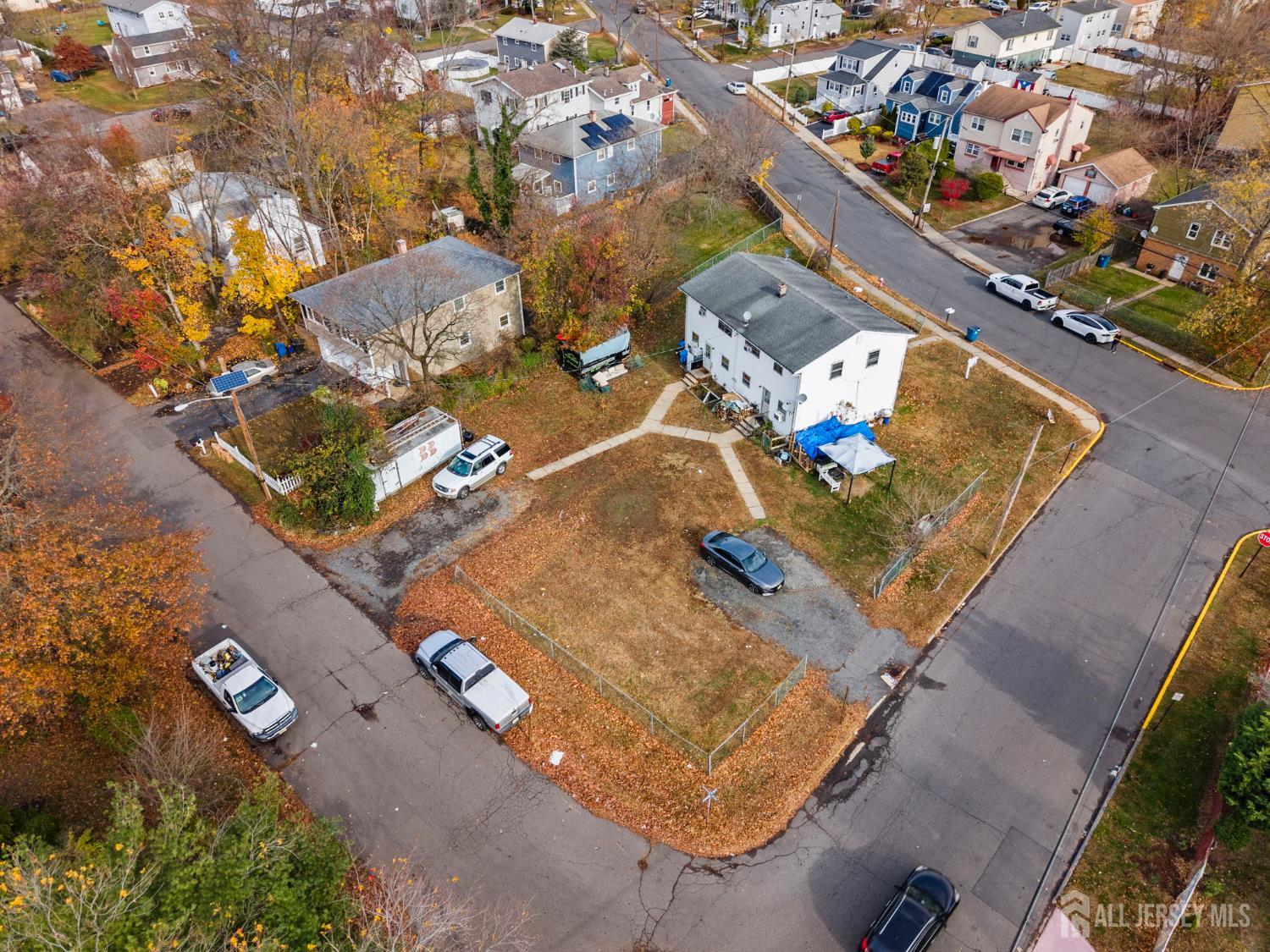 16 Millstone Road Somerset, NJ 08873 - Photo 4 of 35 an aerial view of a house with a yard