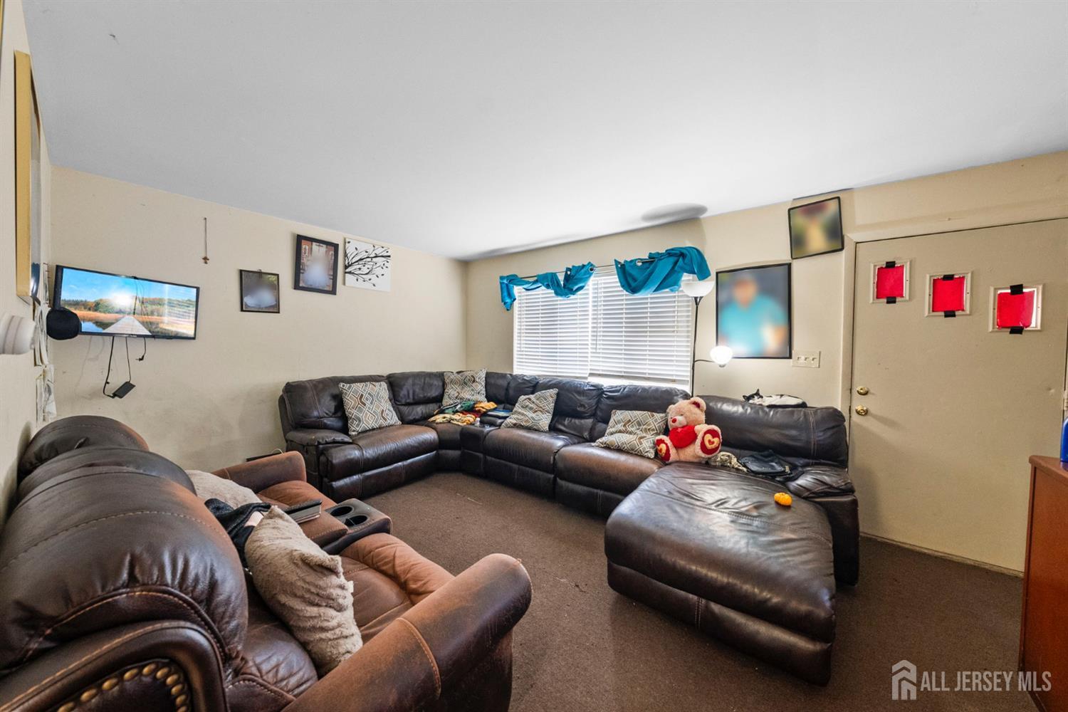 16 Millstone Road Somerset, NJ 08873 - Photo 7 of 35 a living room with furniture and a couch