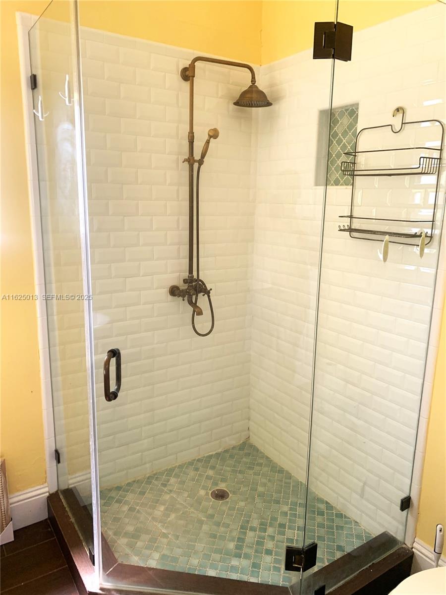 22750 Southwest 154th Avenue Miami, FL 33170 - Photo 17 of 37 a bathroom with a shower
