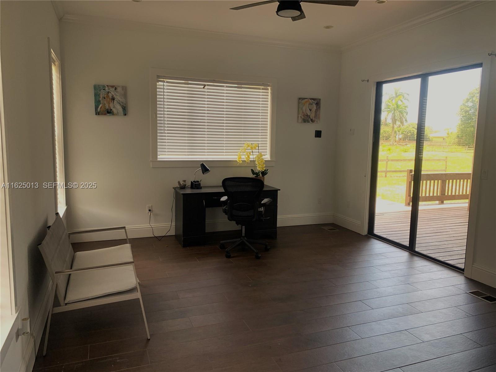 22750 Southwest 154th Avenue Miami, FL 33170 - Photo 18 of 37 a living room with furniture and a window