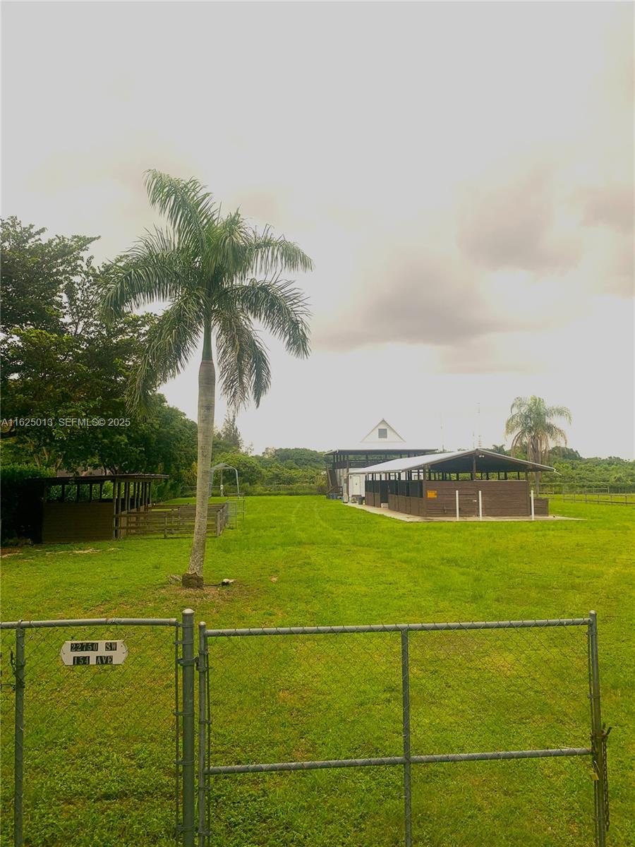 22750 Southwest 154th Avenue Miami, FL 33170 - Photo 28 of 37 an aerial view of a houses with outdoor space swimming pool and ocean