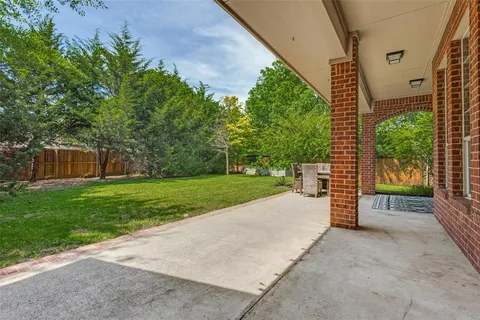 a view of a back yard with the garden