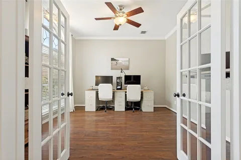 a view of kitchen with furniture and window