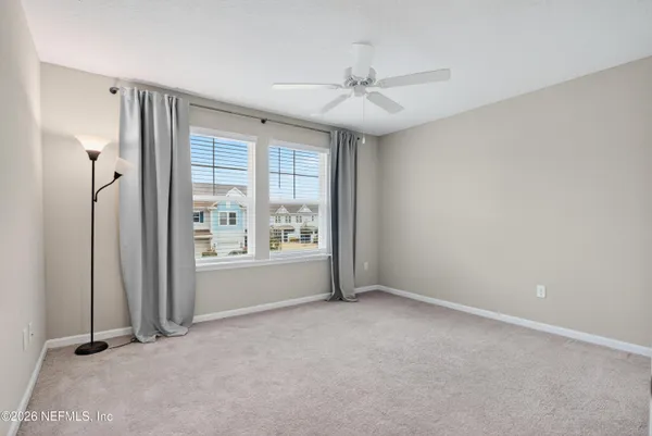 an empty room with windows