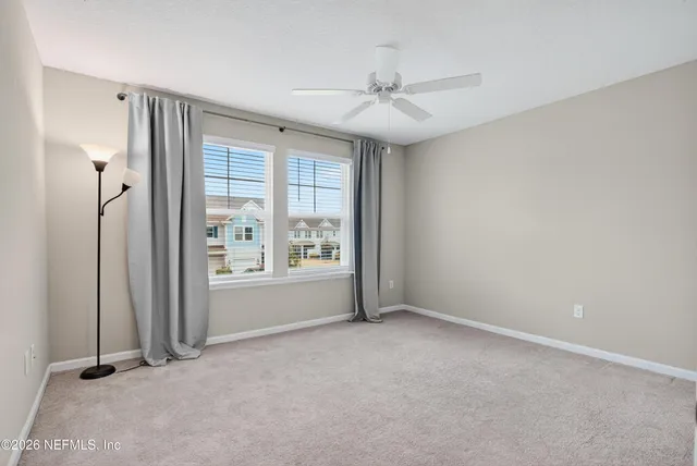 an empty room with windows