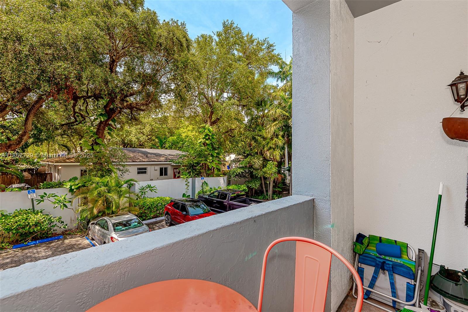 2734 Bird Avenue, Unit 107 Miami, FL 33133 - Photo 13 of 15 a view of a balcony with chairs